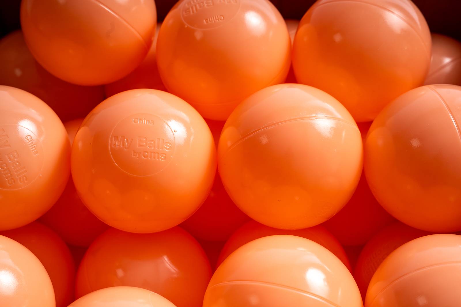 15 g commercial grade ball pit balls, bubble orange color