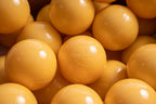 15 g commercial grade ball pit balls, yellow mango powder colors