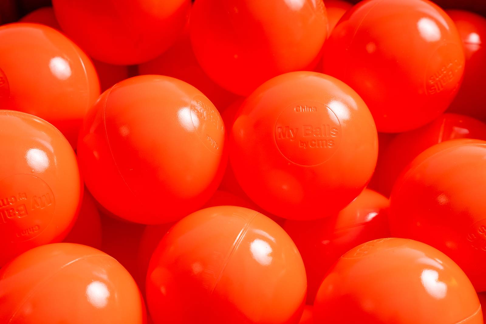 15 g commercial grade ball pit balls, orange color