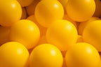 15 g commercial grade ball pit balls, yellow matte color